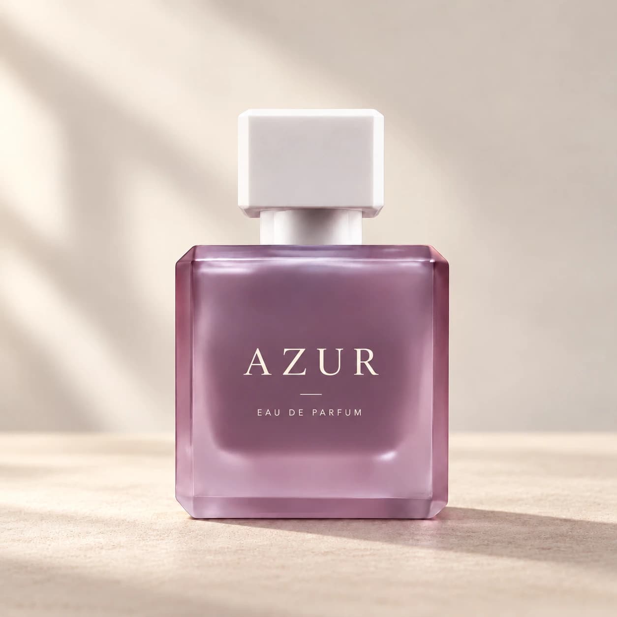 Simple square frosted-purple perfume bottle with white cap and Azur artwork