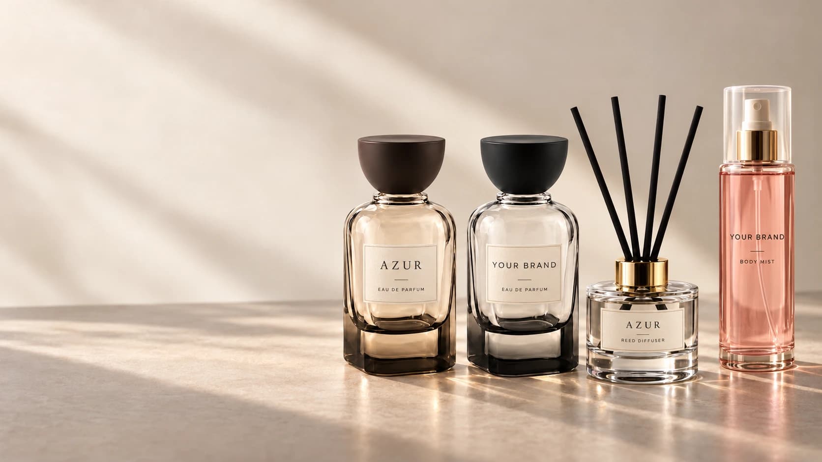 Azur and Your Brand perfume, reed diffuser and body mist packaging in a warm studio setting