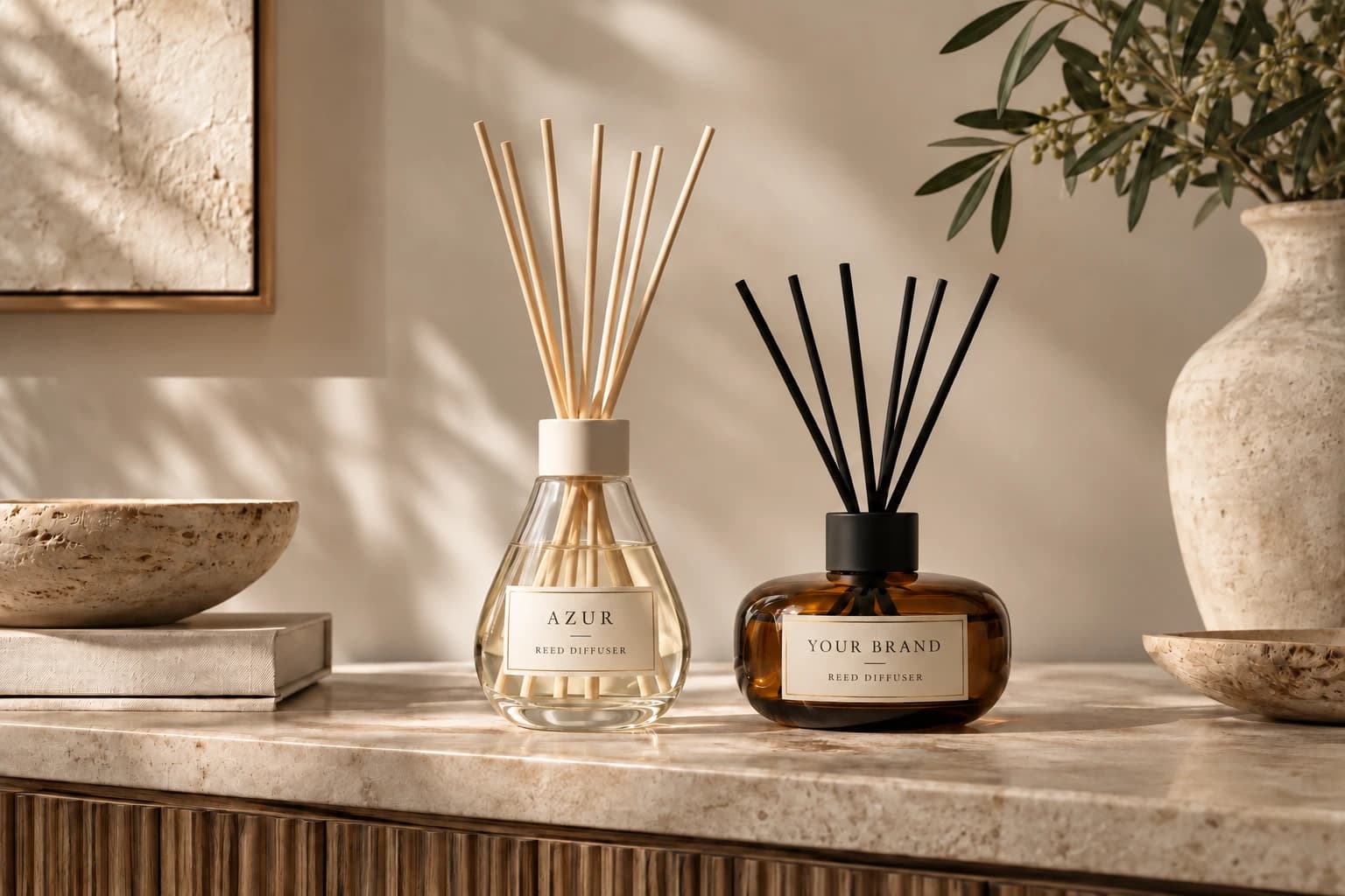 Two reed diffuser shapes with contrasting collars and reeds in a warm interior